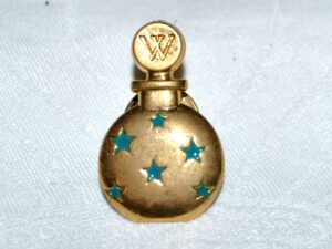 WORTH Pins broche Flacon Parfum doré - Bijou parfumeur "Dans la nuit"