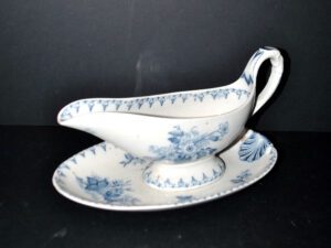 SARREGUEMINES Utschneider Saucière Flore en faïence à fleurs bleu