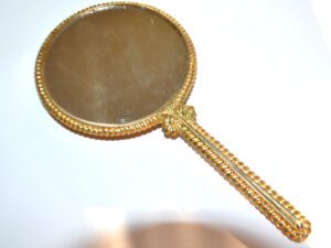 Miroir de poche vintage face-à-main doré et peau de serpent